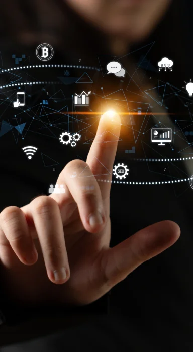 A man in a suit gesturing toward the details on a large, stylized identification card.