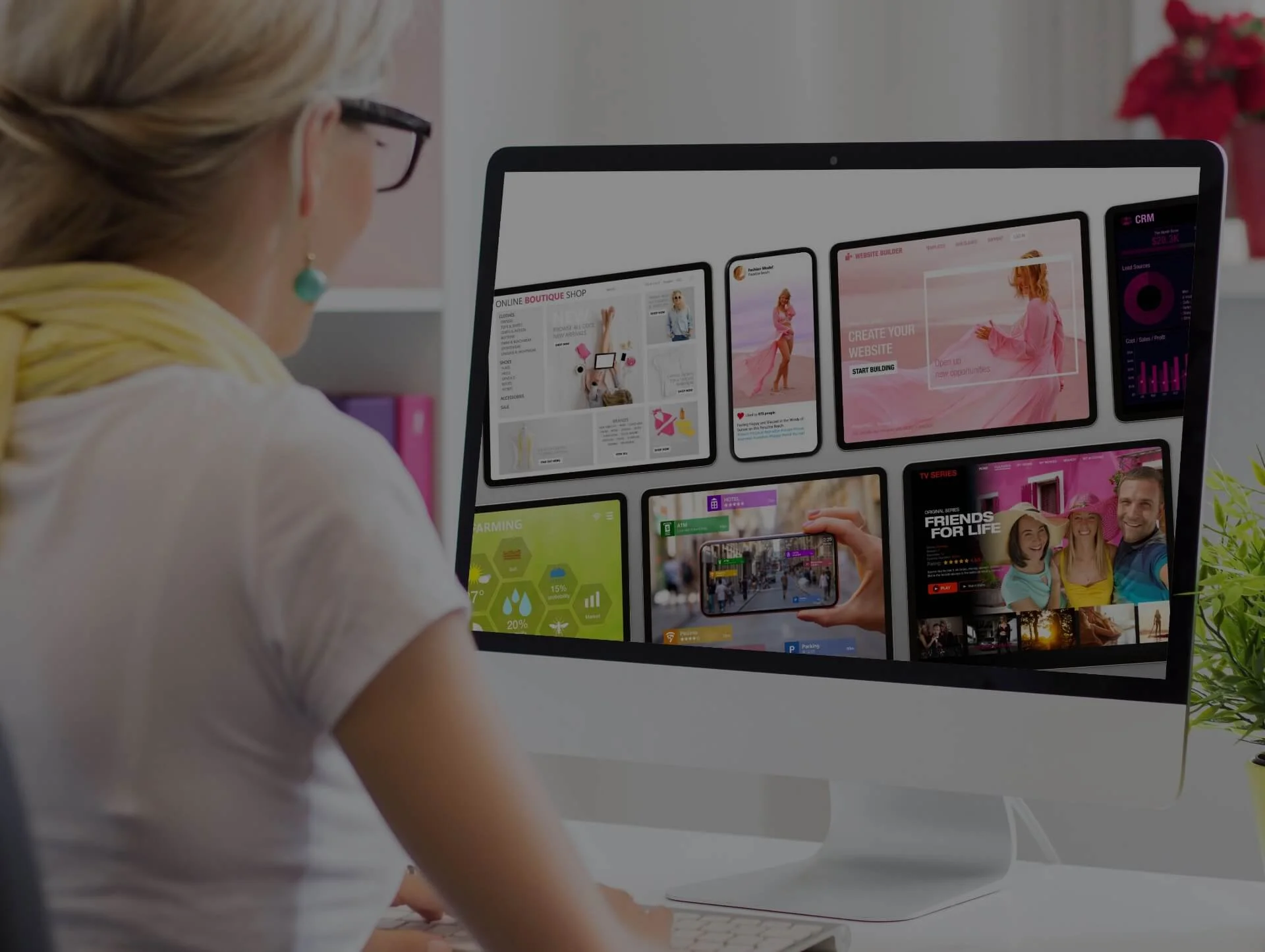 Web designing and development services showcased through a creative display of brand websites, including B2C elements, on a desktop monitor