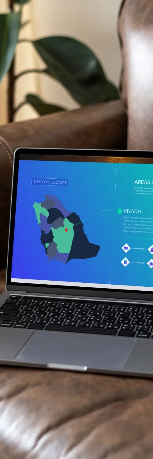 A hand writing in an open notebook under a lightbulb, representing Digital Design Services from a creative digital design agency