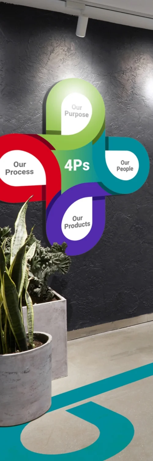 Offline Print Design Services featuring a creative visual of a green chair balanced on a hand, symbolizing the precision of print design solutions