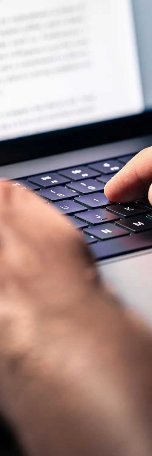 Vintage typewriter with the phrase 'In the beginning...', representing the start of creating ad copy in digital marketing service