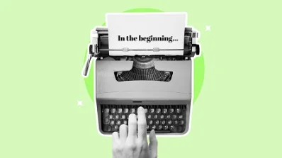 Vintage typewriter with the phrase 'In the beginning...', representing the start of creating ad copy in digital marketing service