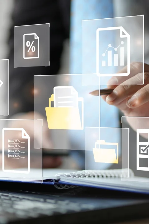 A person interacting with digital file management, symbolizing PIM Implementation Services and Pimcore digital asset management for organized data flow.